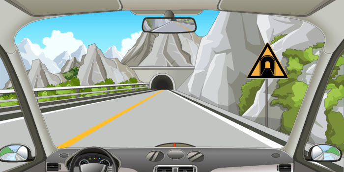 图示为隧道警告标志,警告前方是双向行驶的隧道,驾驶人此时要注意慢